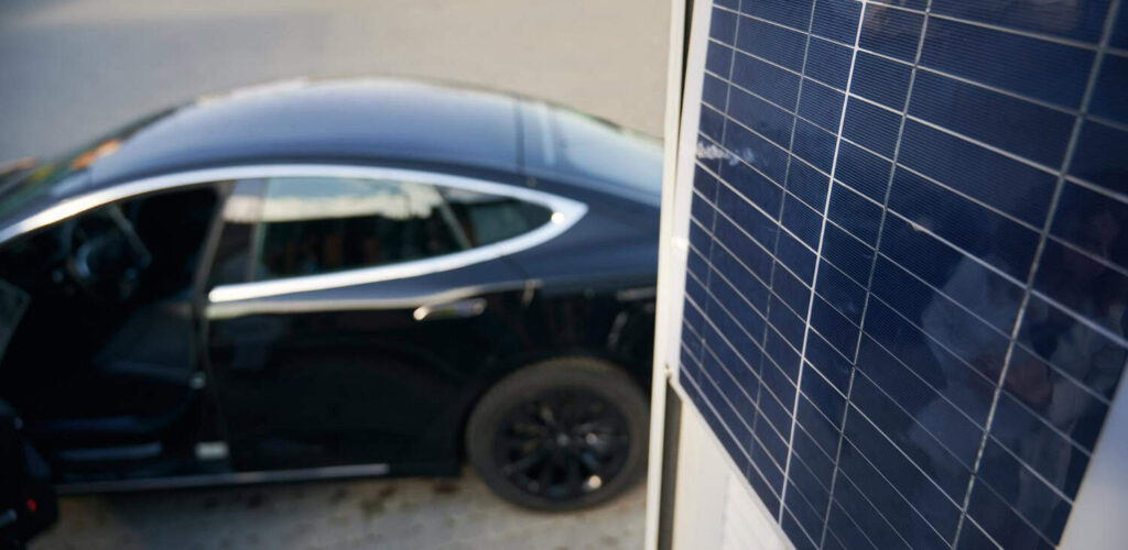 Eco-friendly car EV charger installation in Kitchener with a solar-powered charger for a Victoria Park home, supporting green energy.